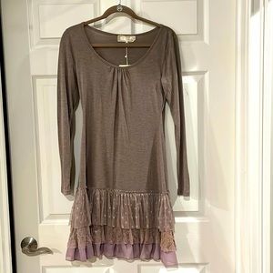 Women’s dress with flutter layers at bottom.